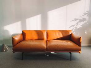 A Leather Sofa, Which Needs To Be Regularly Cleaned To Prevent Sweat And Oil Accumulation.